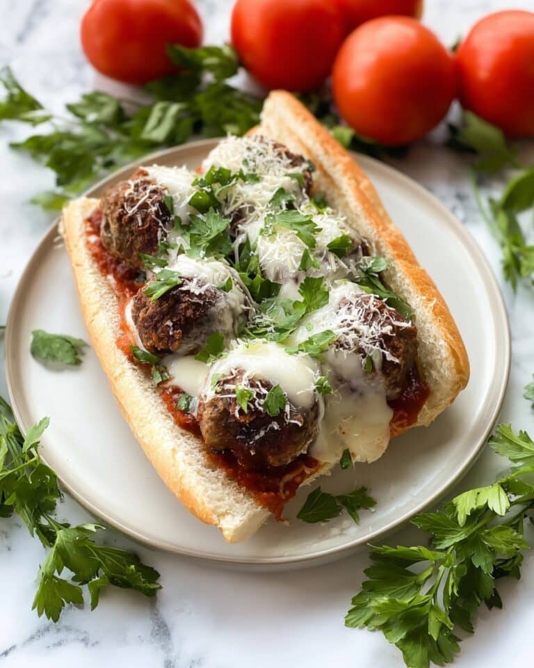 Meatball Sandwich with Marinara Sauce and Melted Cheeses Recipe